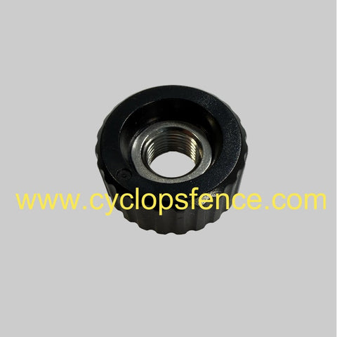 black fence terminal knob for a cyclops electric fence charger on grey background