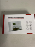 Box with a PWM Solar Charge Controller for electric fence charger systems on a plain background