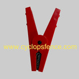 Red electric fence clamp on a gray background with 'www.cyclopsfence.com' text.